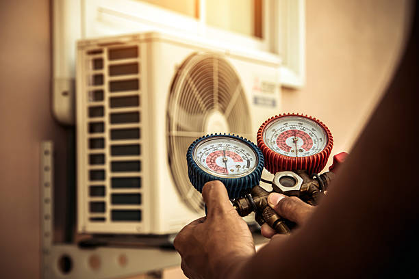 Professional Hvac technician working in Bradley, OK